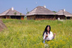 A girl and ethno village on Zlatibor (Photo: R. Sazdić)